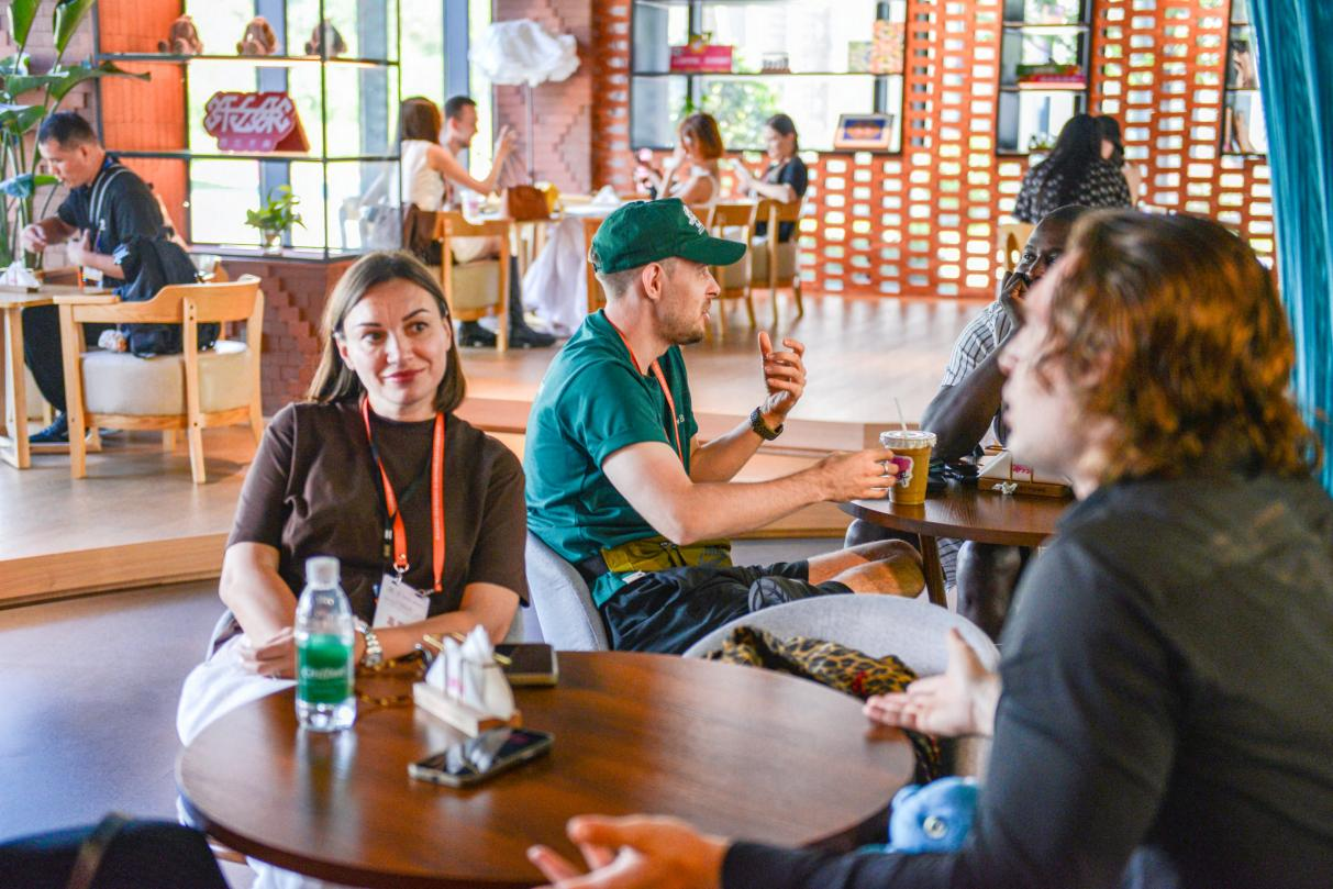 Visitors sharing refreshments after a museum and craft visit