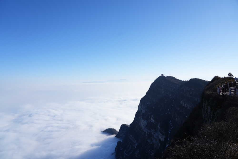 Clouds and mountain cliffs from Mount Emei’s Golden Summit