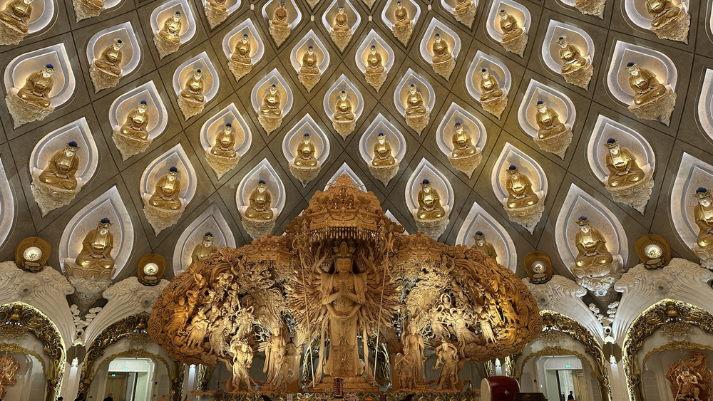 Guanyin beneath a canopy of golden images · Guanyin Fajie